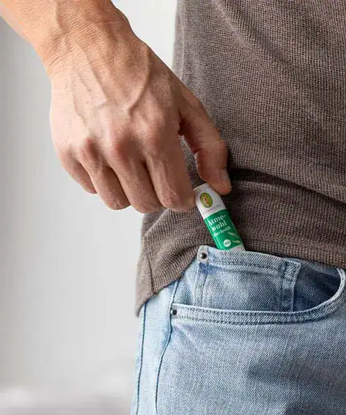 Person placing a Makasa Etch Blueprint device in pocket.