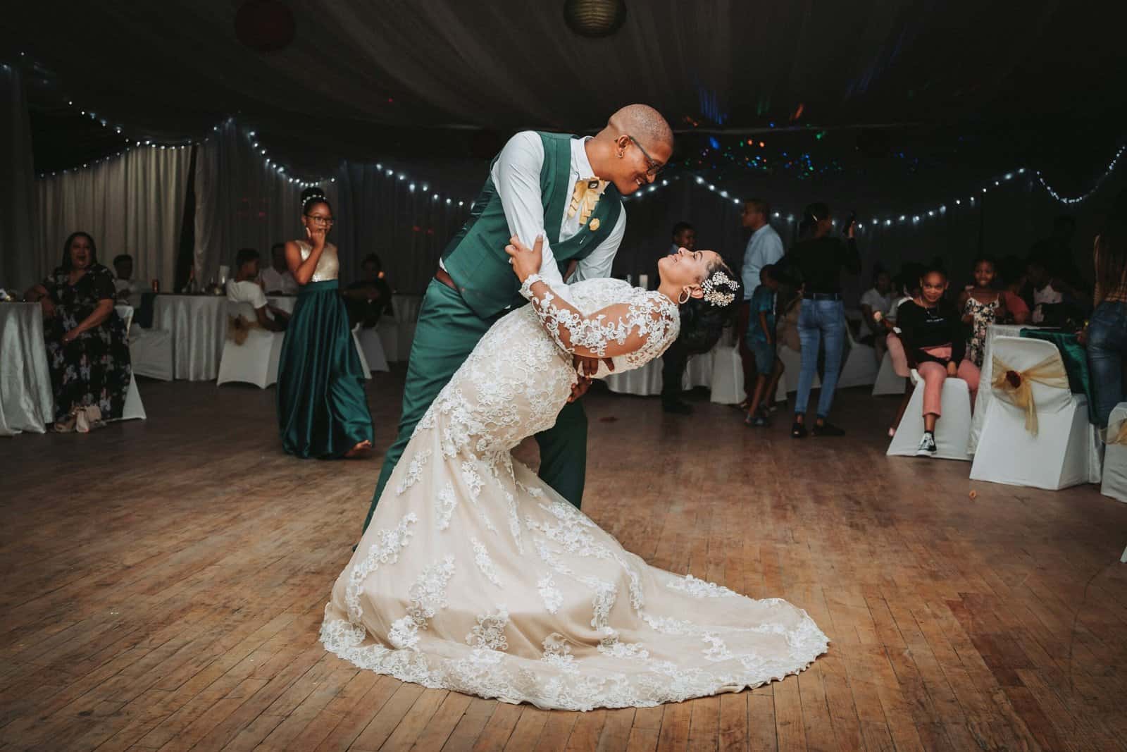 Elegant wedding dance photo with bride and groom.